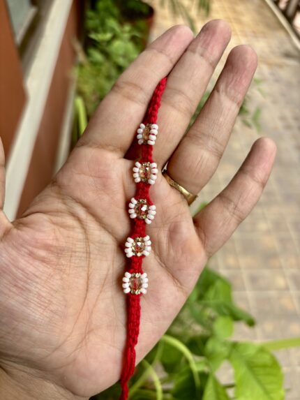 Minimal Red Thread Rakhi with Pearls
