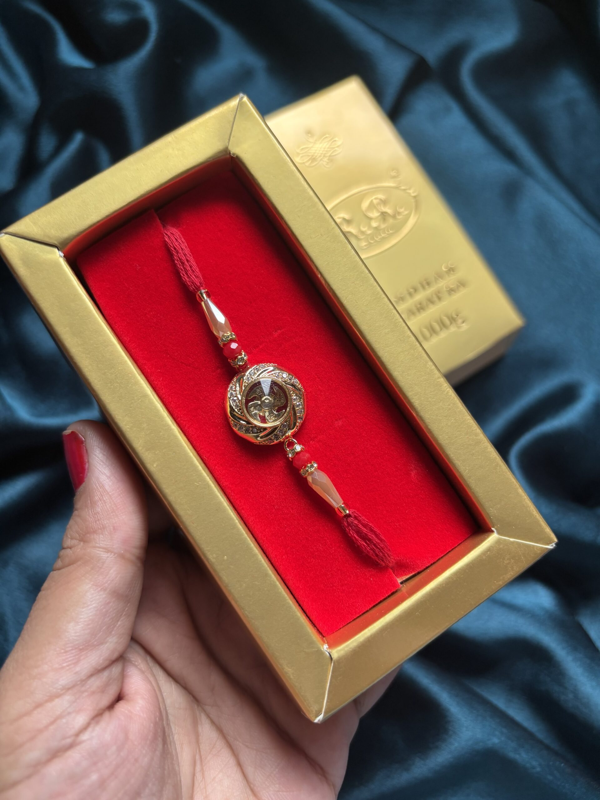 Premium Dual-tone golden and silver rotating Rakhi