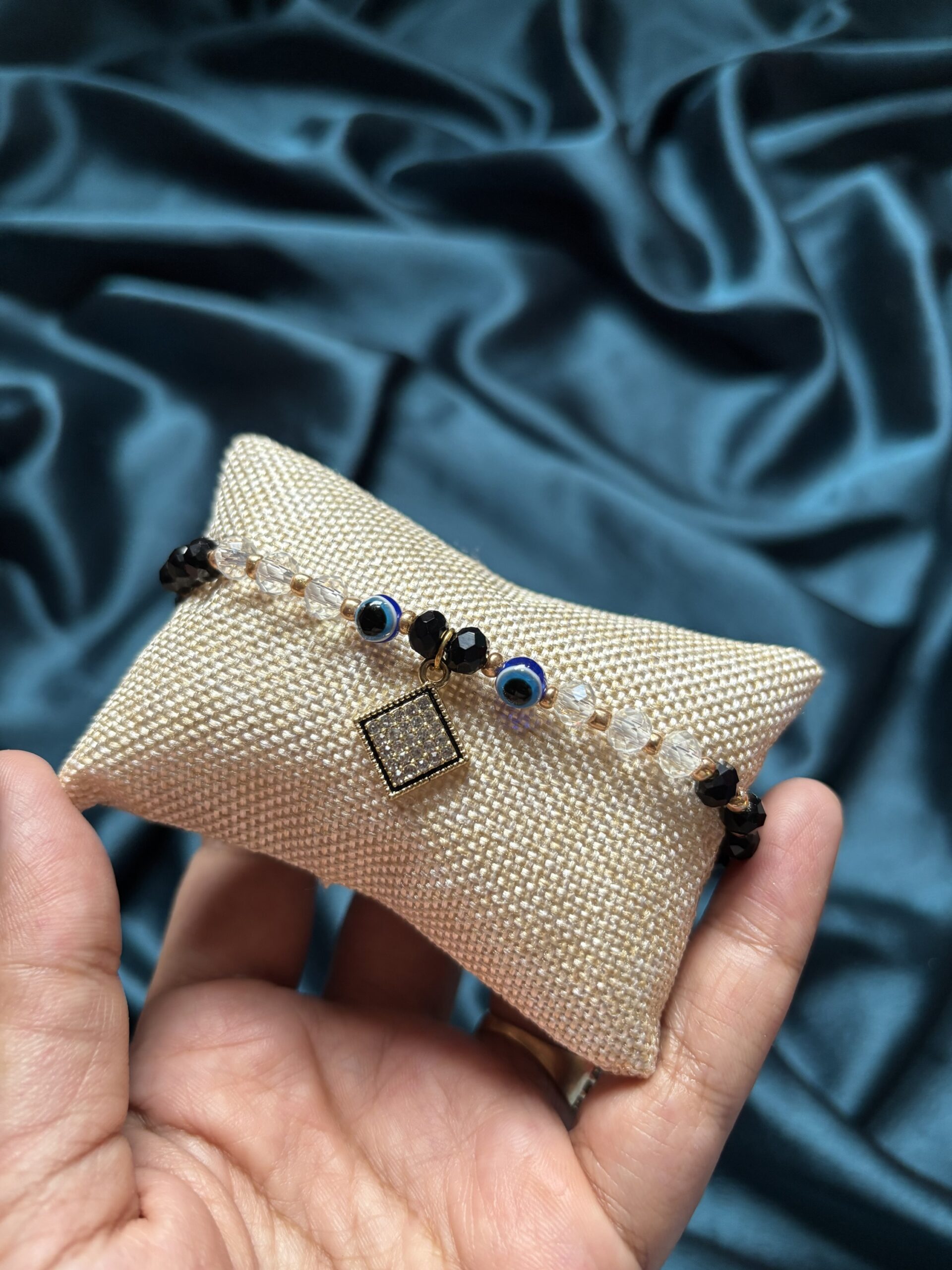 Evil eye bracelet Rakhi with black beads AD charm